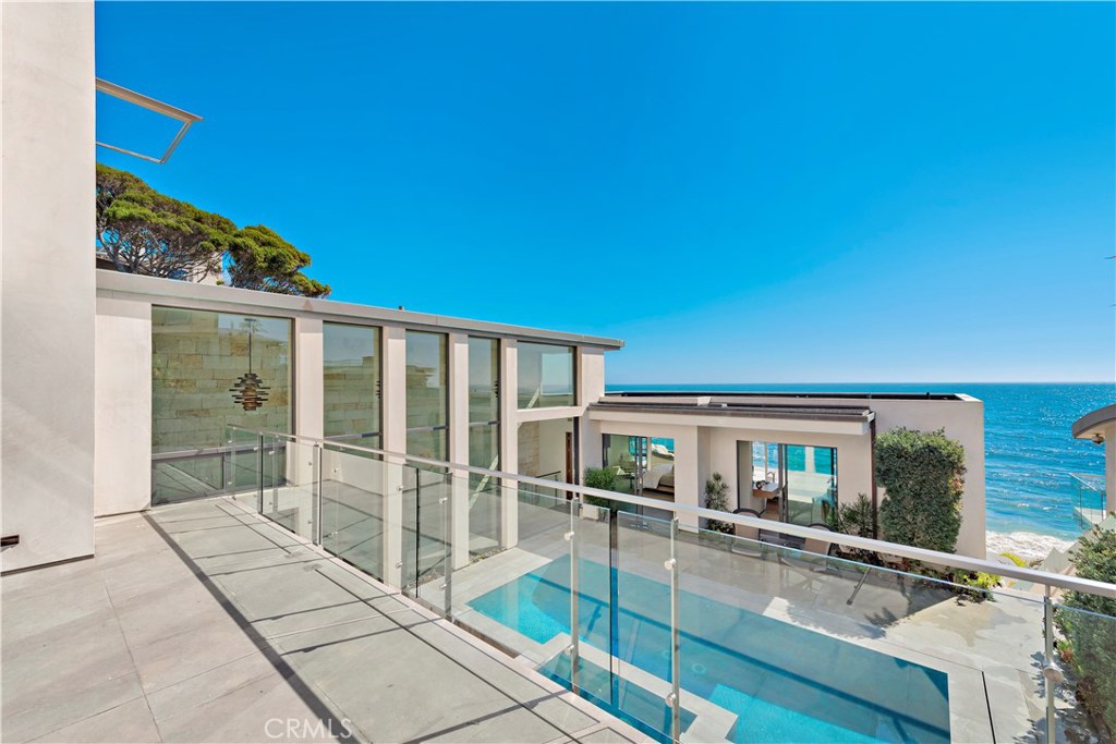 Top level view deck outside of guest bedrooms. - 992 Ocean Front, Laguna Beach CA 92651 - photo 1