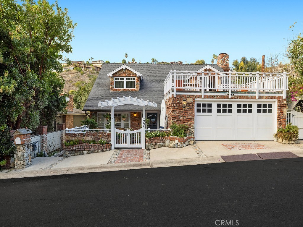 Remodeled by Gregg Abel, the home’s interior, which spans over 3,432 square feet, is picturesque. - 994 Bluebird Canyon Drive, Laguna Beach CA 92651 - photo 1