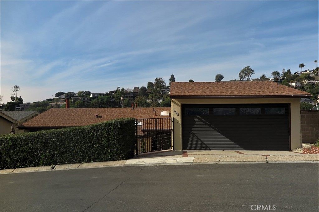 Street level garage, 1 flight of stairs down to the house - 998 Oriole Drive, Laguna Beach CA 92651 - photo 1
