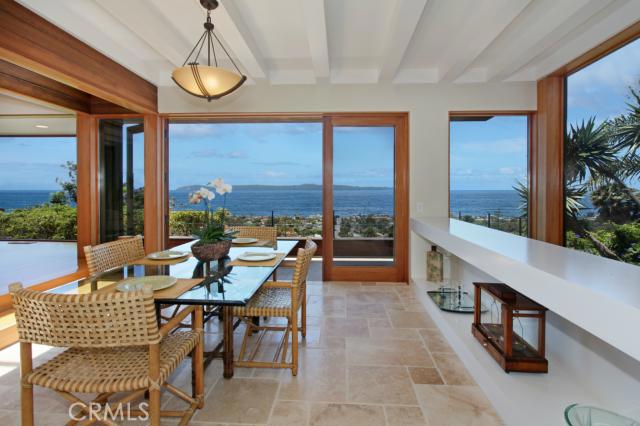 Ocean view dining room. - 999 Coast View Drive, Laguna Beach CA 92651 - photo 1