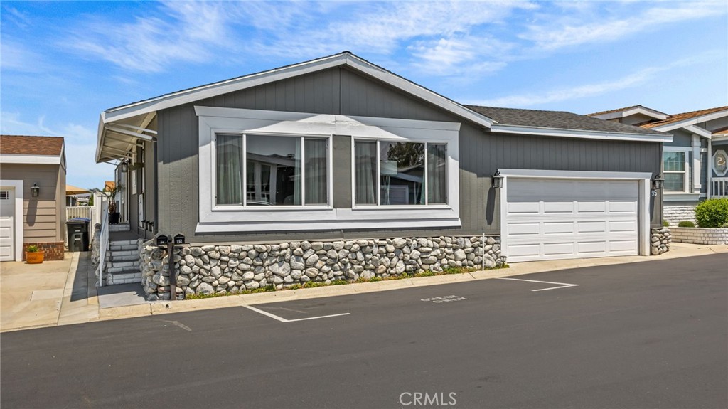 FRONT OF HOME 2 FULL SIZE GARAGE PARKING - 23301 Ridge Route Drive 95, Laguna Hills CA 92653 - photo 1