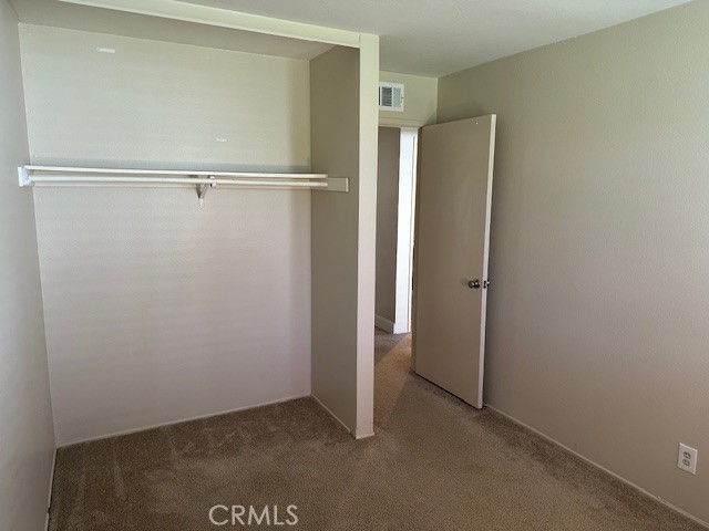 second bedroom closet - 23325 Caminito Juanico, Laguna Hills CA 92653 - photo 10