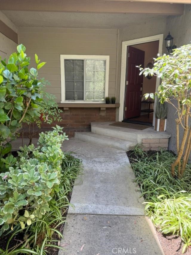 Private Front Entry Walkway (Daytime) - 24292 Dale Drive 193, Laguna Hills CA 92653 - photo 1
