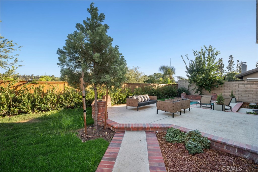 Mature landscaping & newly planted trees add beauty & privacy to the outdoor environment - 25182 Stockport, Laguna Hills CA 92653 - photo 27