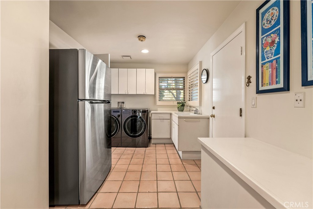 Laundry, craft and storage rooms - 25442 Rapid Falls, Laguna Hills CA 92653 - photo 28