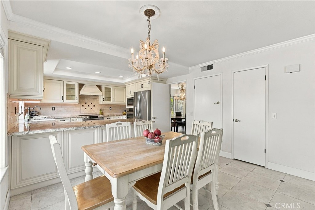 Break fast area looking into kitchen and breakfast bar - 25516 La Mirada Street, Laguna Hills CA 92653 - photo 13