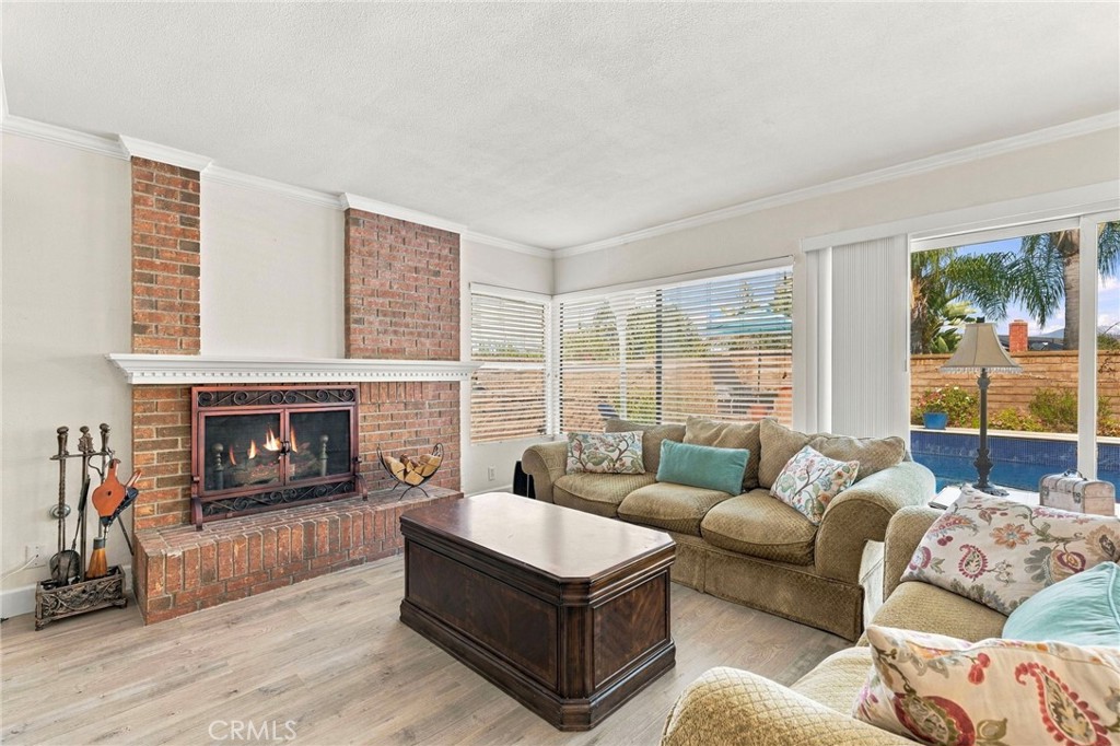 Family room with view of pool - 25516 La Mirada Street, Laguna Hills CA 92653 - photo 17