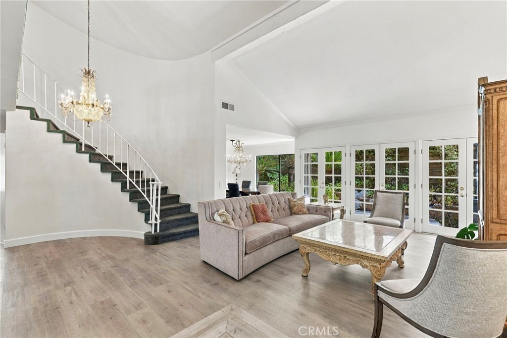 Spacious living room with French doors - 25516 La Mirada Street, Laguna Hills CA 92653 - photo 20