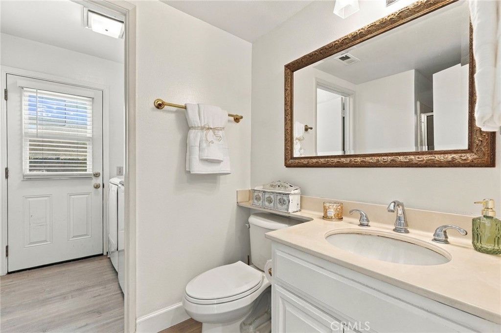 Main floor bathroom with Shower, vanity, and toilet - 25516 La Mirada Street, Laguna Hills CA 92653 - photo 26