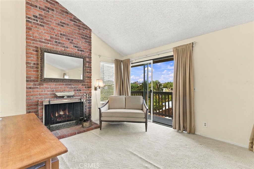 Another view of primary bedroom sitting area with balcony - 25516 La Mirada Street, Laguna Hills CA 92653 - photo 30