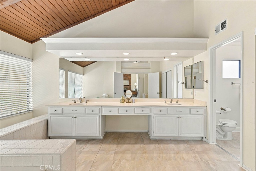 Primary bathroom with double sink vanity - 25516 La Mirada Street, Laguna Hills CA 92653 - photo 34
