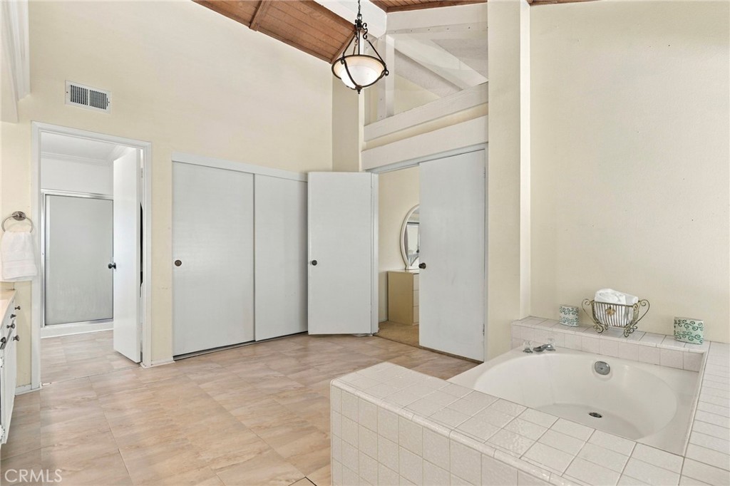 Primary bathroom with soaking tub - 25516 La Mirada Street, Laguna Hills CA 92653 - photo 35