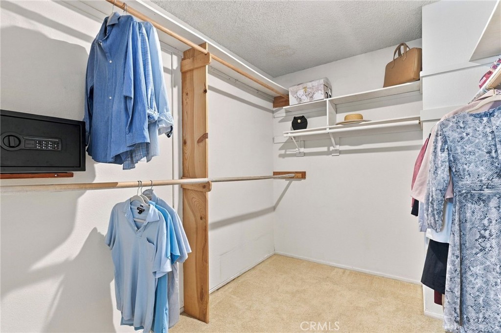 Primary walk-in closet - 25516 La Mirada Street, Laguna Hills CA 92653 - photo 36