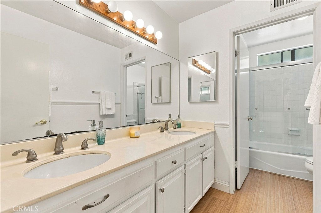 Hall bathroom with Double sink vanity - 25516 La Mirada Street, Laguna Hills CA 92653 - photo 39