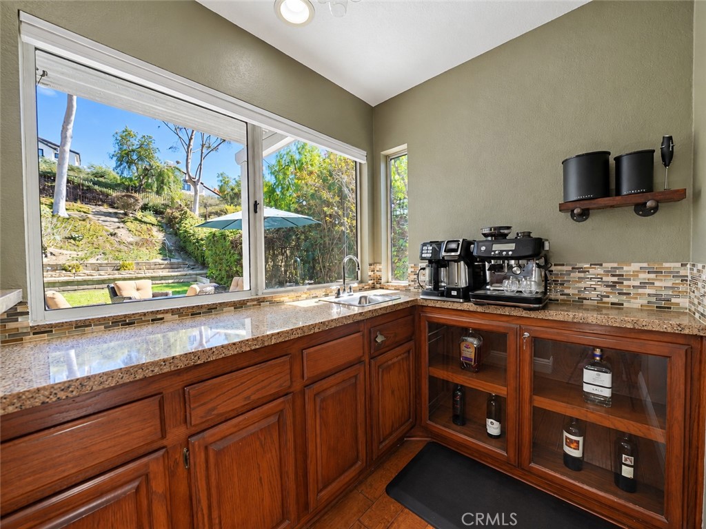 This wet bar is the perfect addition off the family room for entertaining with friends and family - 25652 Nottingham Court, Laguna Hills CA 92653 - photo 13