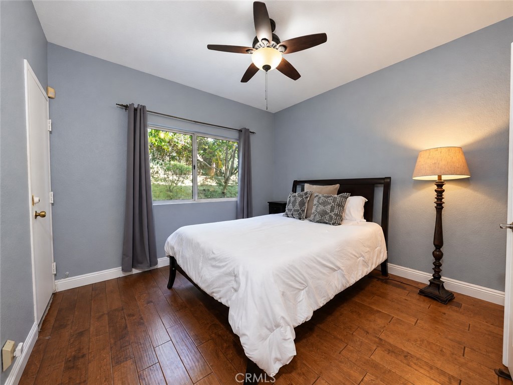 Desirable main floor bedroom is perfect for your guests or optional office space - 25652 Nottingham Court, Laguna Hills CA 92653 - photo 14