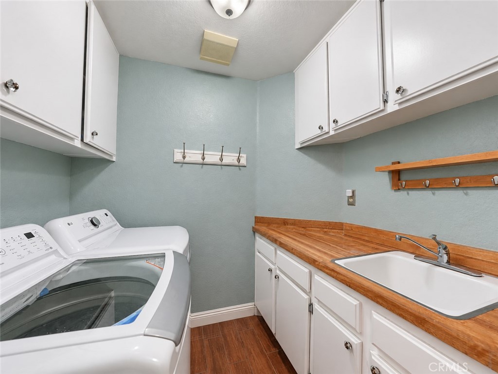 Laundry is conveniently located on the main floor - 25652 Nottingham Court, Laguna Hills CA 92653 - photo 16