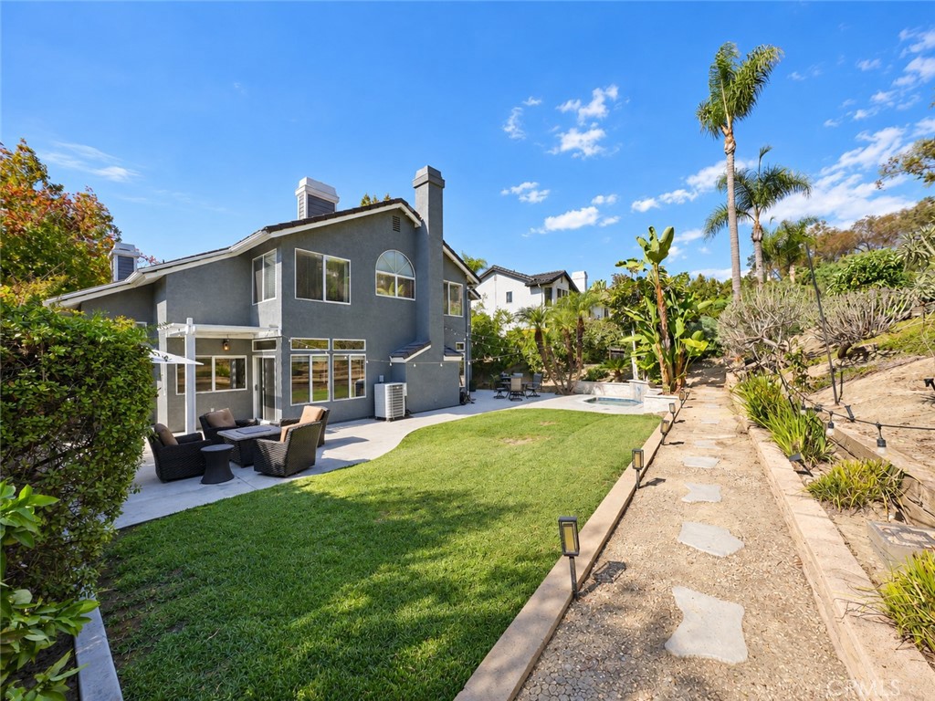 Blending spacious indoor and outdoor living areas with practical features for a comfortable lifestyle, this home is a ra - 25652 Nottingham Court, Laguna Hills CA 92653 - photo 36