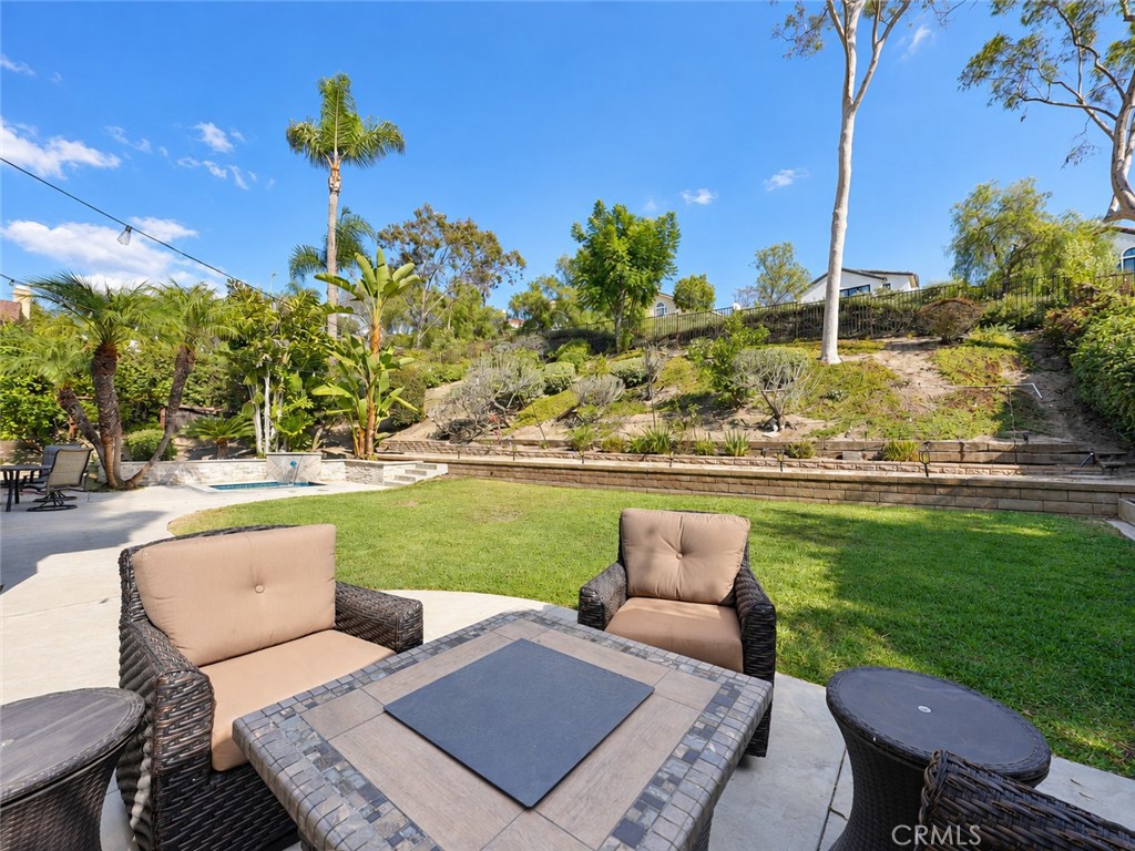 This large exterior space is equally suited to quiet dinners or larger events - 25652 Nottingham Court, Laguna Hills CA 92653 - photo 40