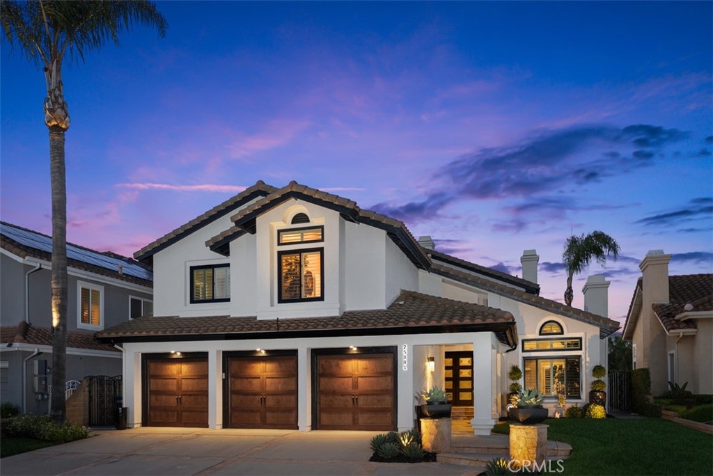 Front Exterior | 3-Car Garage | Panoarmic Mountain Views in Backyard - 25881 Cedarbluff, Laguna Hills CA 92653 - photo 1