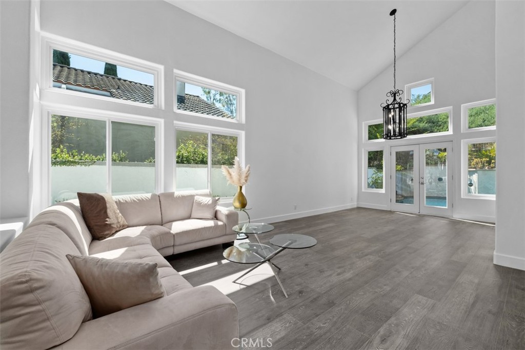 Livingroom and Diningroom - Two story ceilings - 26741 Bridlewood Drive, Laguna Hills CA 92653 - photo 19