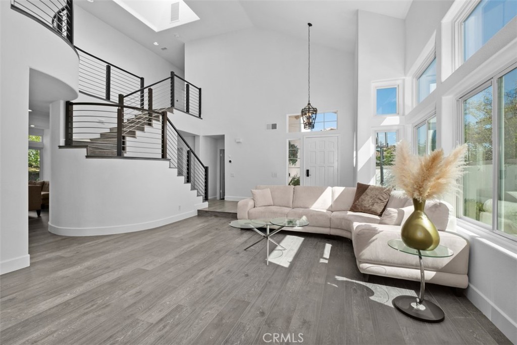 Livingroom Two story ceilings - 26741 Bridlewood Drive, Laguna Hills CA 92653 - photo 20