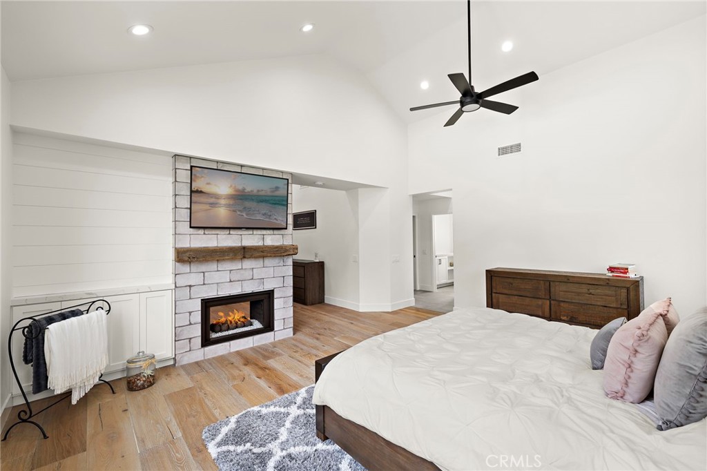 Dual sided fireplace in upstairs primary suite - 27562 Lost Trail Drive, Laguna Hills CA 92653 - photo 28