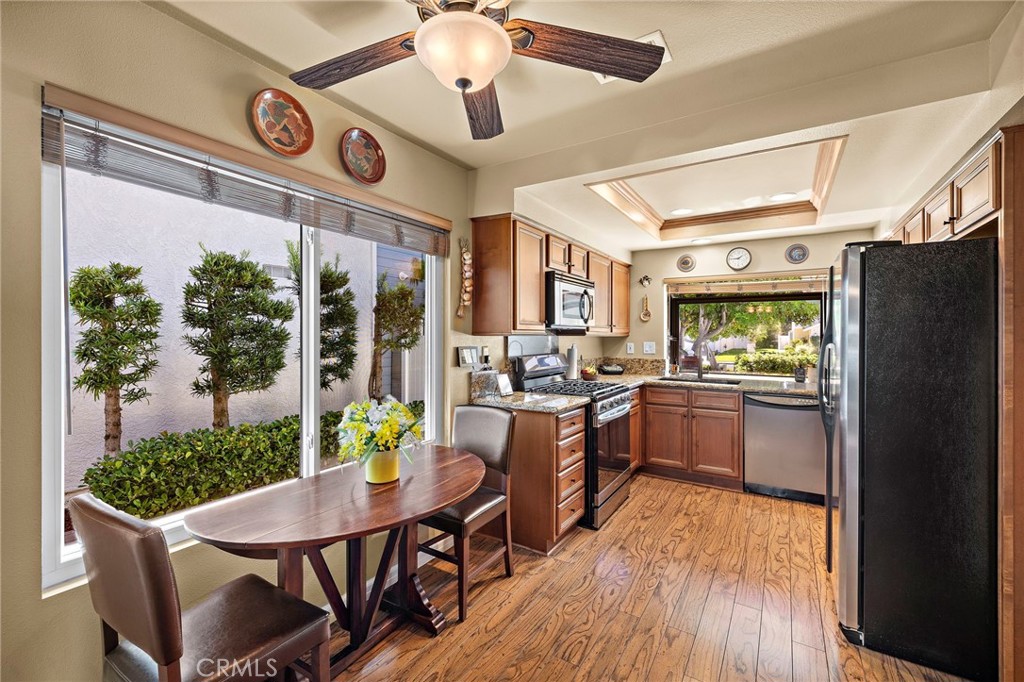 Updated kitchen with large window and garden window over the sink - 30 Oxbow Creek, Laguna Hills CA 92653 - photo 12
