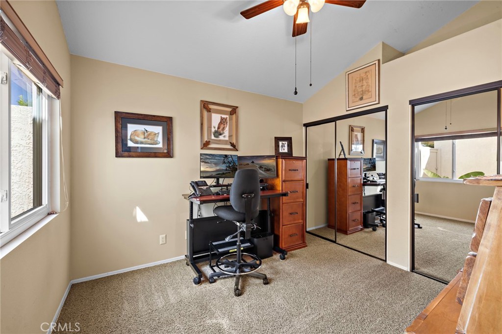 Second bedroom with mirrored double closet doors - 30 Oxbow Creek, Laguna Hills CA 92653 - photo 16