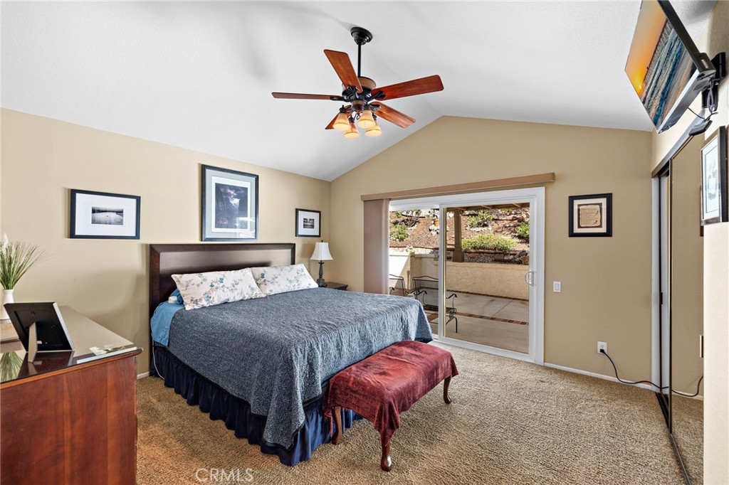 Nice size primary bedroom with sliding doors to outside patio - 30 Oxbow Creek, Laguna Hills CA 92653 - photo 18