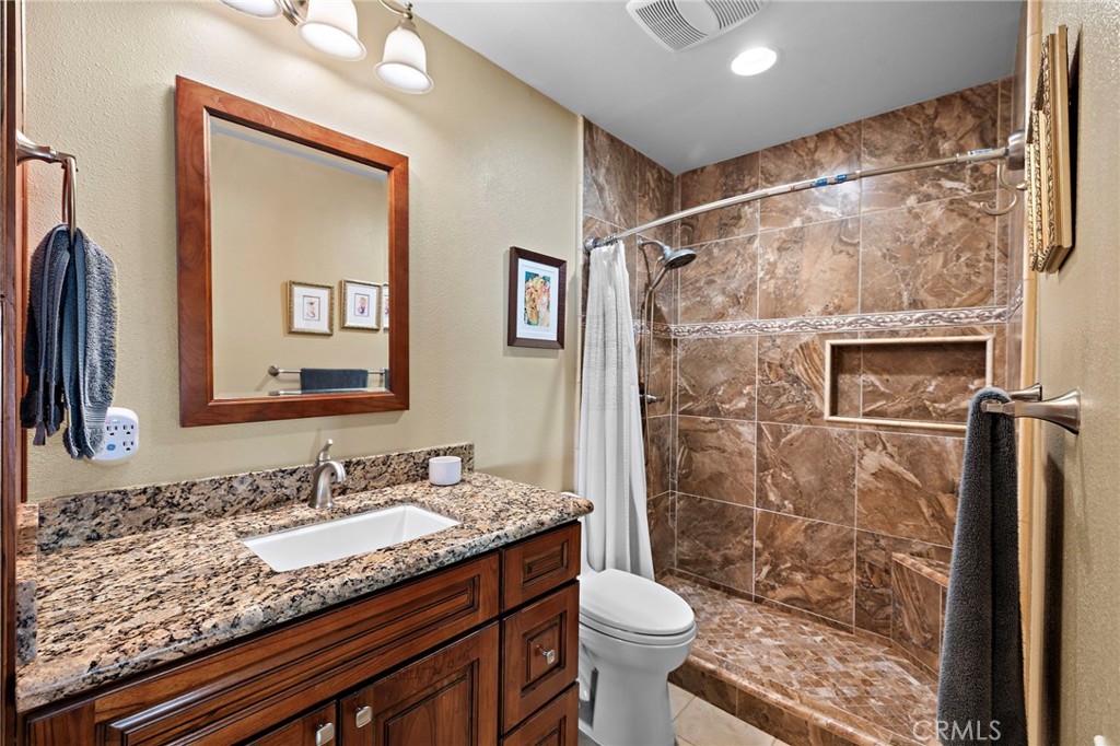 Updated primary bathroom with walk-in shower - 30 Oxbow Creek, Laguna Hills CA 92653 - photo 20