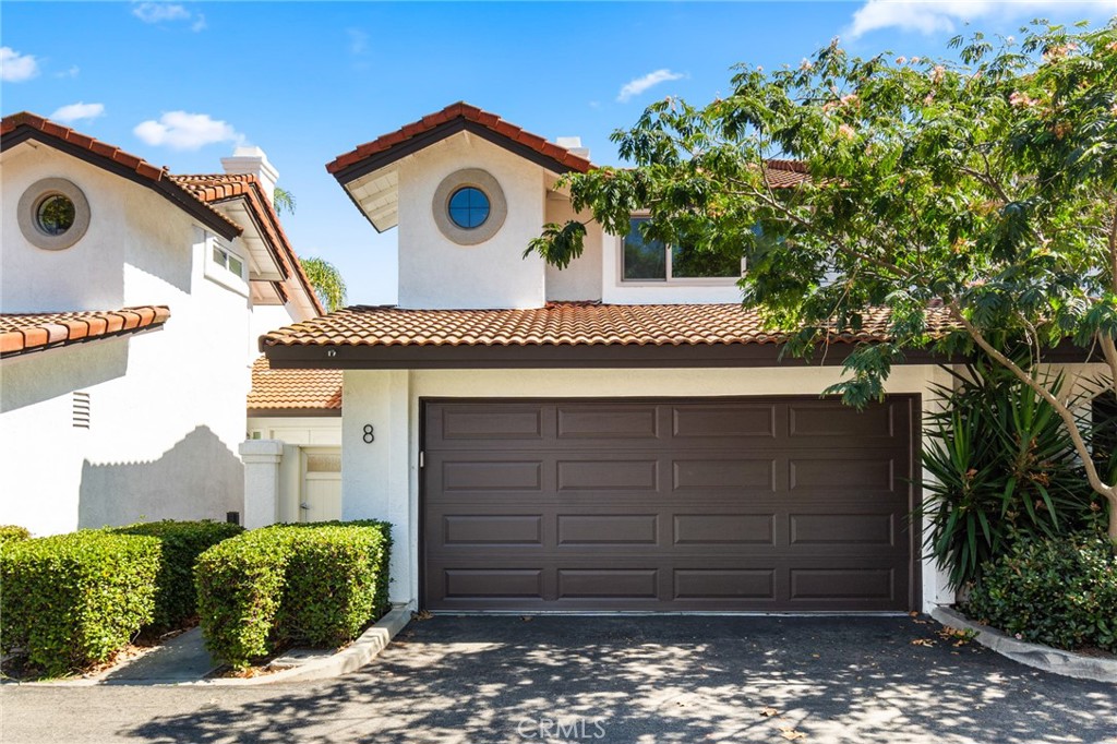 Front Entry. Photo taken in 2023 prior to leasing. - 8 Clover Hill Lane 120, Laguna Hills CA 92653 - photo 1