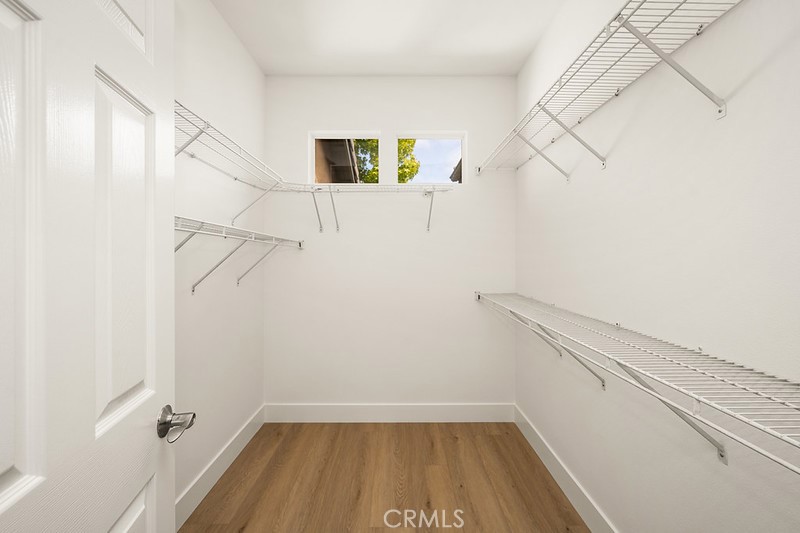 Primary walk-in closet - 100 Stoney Pointe, Laguna Niguel CA 92677 - photo 24