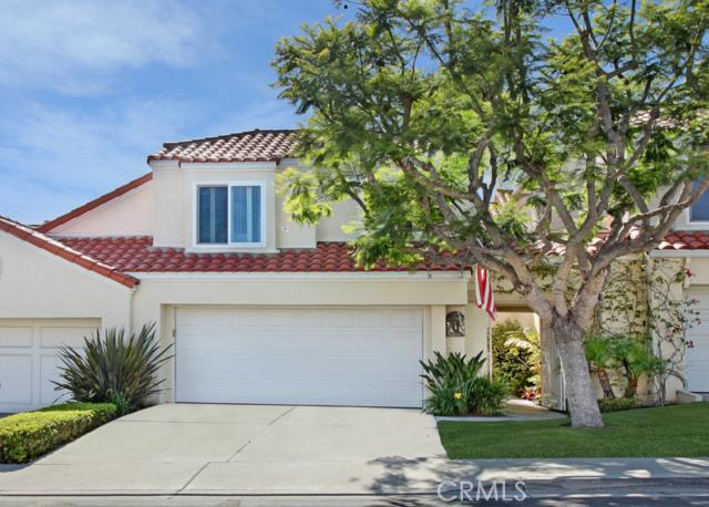 Beautiful curb appeal with courtyard entry and jacaranda tree in front. - 11 Antibes, Laguna Niguel CA 92677 - photo 1