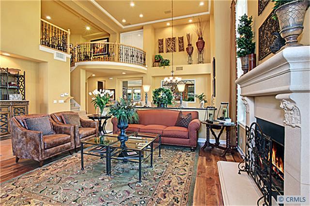 Two entry ceilings in the impressive living room with stone fireplace - 15 ASILOMAR Road, Laguna Niguel CA 92677 - photo 1