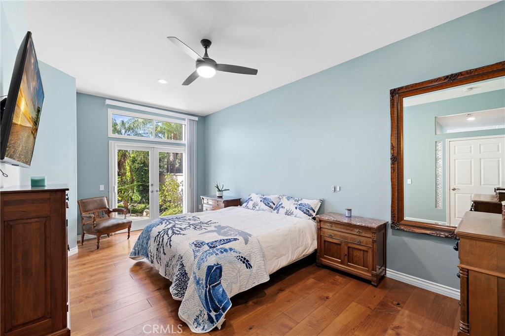 Primary Bedroom /w French Door to Lush Backyard - 15 Costa Brava, Laguna Niguel CA 92677 - photo 22