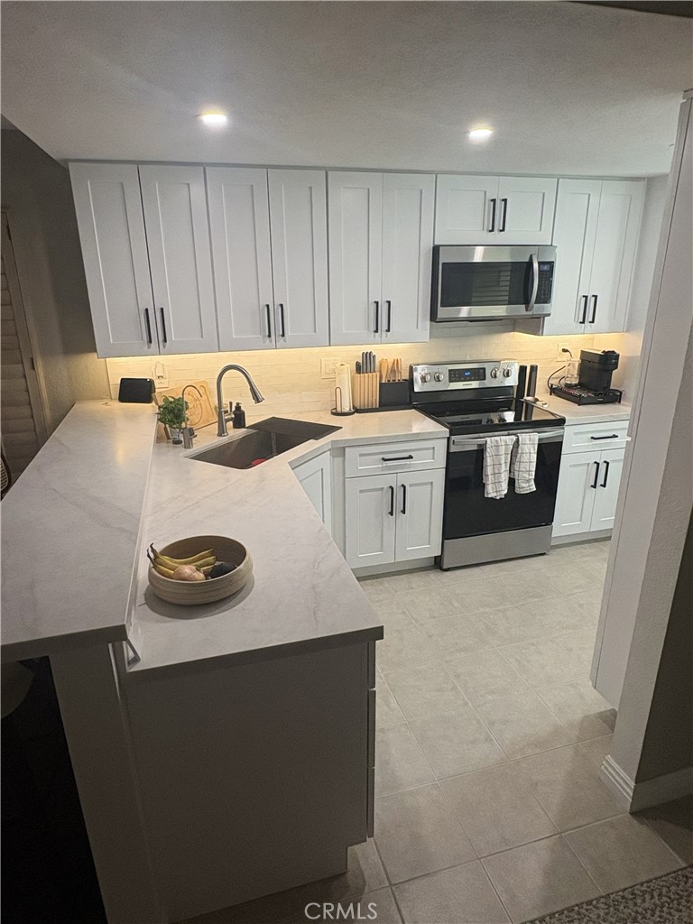 Newly Upgraded Kitchen with soft closed drawers and cabinets - 16 Pearl 207, Laguna Niguel CA 92677 - photo 5