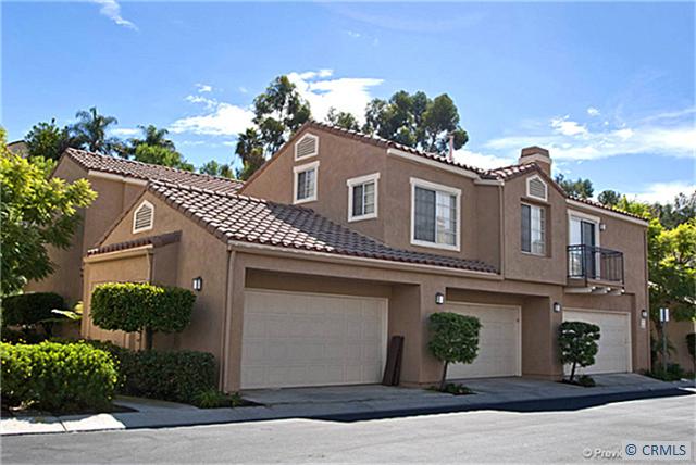 Upgraded townhouse with a 2 car attached garage in a private, interior location. - 183 CHANDON, Laguna Niguel CA 92677 - photo 1