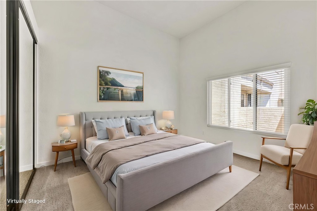Professionally staged primary bedroom featuring a spacious layout, modern design, and a comfortable retreat atmosphere. - 22 Aruba, Laguna Niguel CA 92677 - photo 5