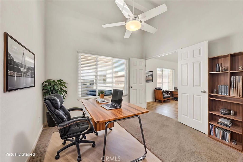 Virtually staged second bedroom, currently configured as a home office. - 22 Aruba, Laguna Niguel CA 92677 - photo 6