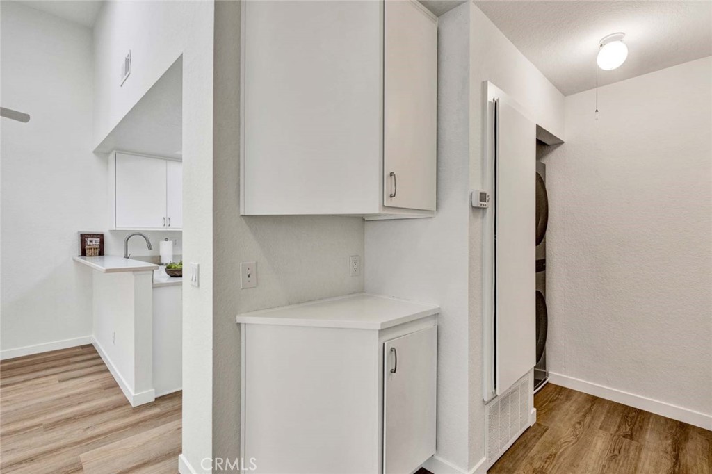 Laundry closet featuring an included washer and dryer. - 22 Aruba, Laguna Niguel CA 92677 - photo 13