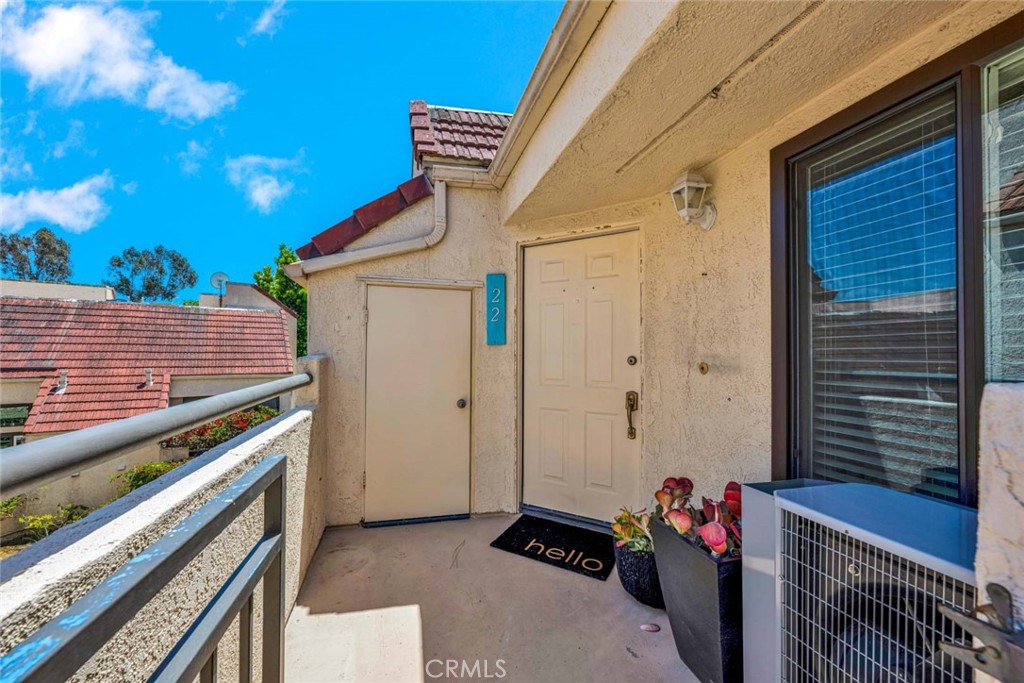 Welcoming front balcony with views of the neighborhood. - 22 Aruba, Laguna Niguel CA 92677 - photo 16
