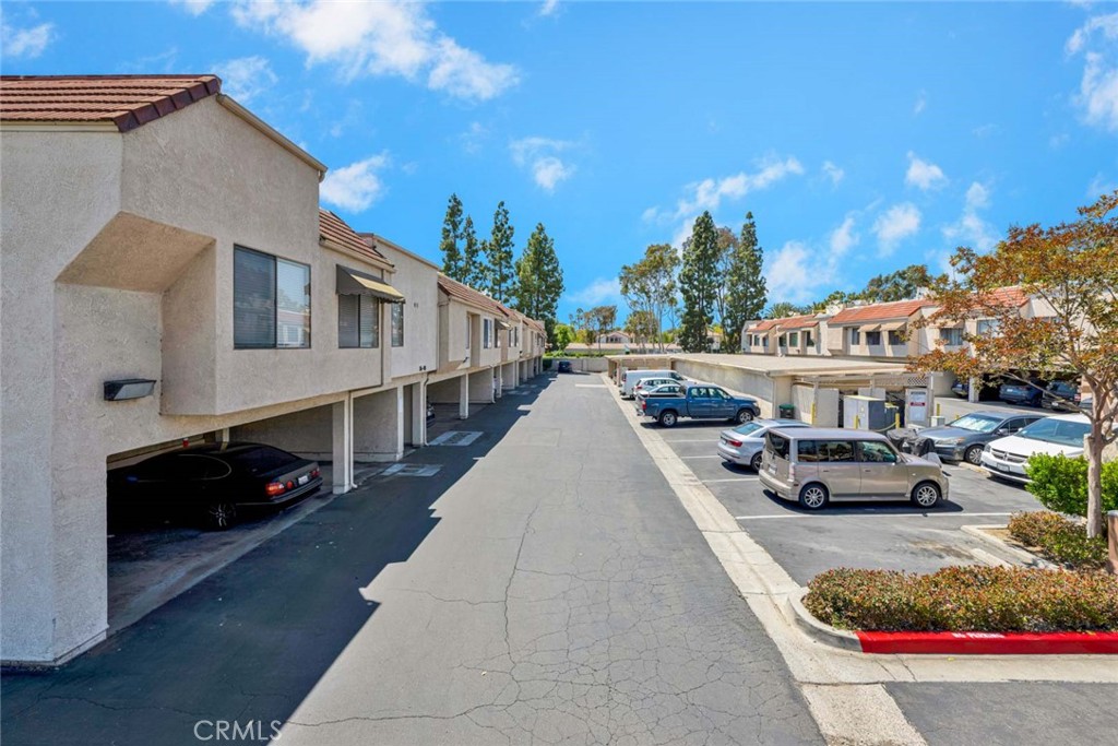 Aruba street view showing the quiet cul-de-sac location directly across from the community pool. - 22 Aruba, Laguna Niguel CA 92677 - photo 18