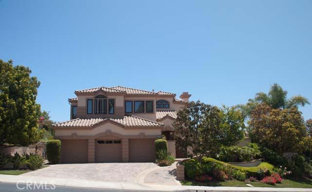 Mediterranean elevation, interlocking paver driveway, random cut stone entry - 22 Emerald Glen, Laguna Niguel CA 92677 - photo 1
