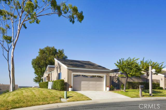 This is a very rare corner house in the quiet age restricted community of Monarch Summit II. These corner homes don't co - 22821 Mariano Drive, Laguna Niguel CA 92677 - photo 1