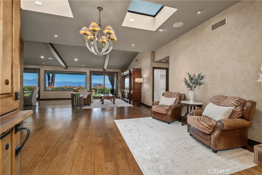 Open living space with soaring ceilings and skylights - 22886 Mariano, Laguna Niguel CA 92677 - photo 8