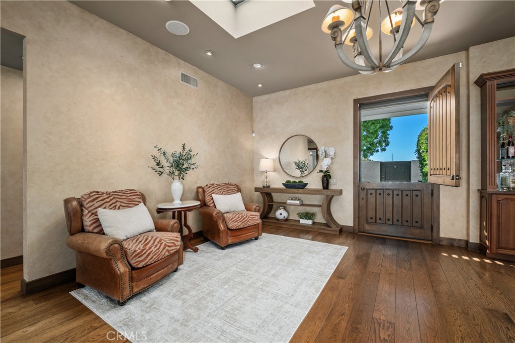 Light-filled living area with vaulted ceilings - 22886 Mariano, Laguna Niguel CA 92677 - photo 10