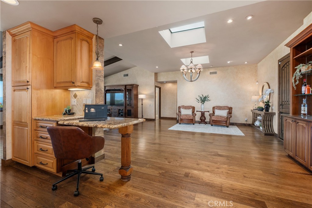 Kitchen opening to the main living area - 22886 Mariano, Laguna Niguel CA 92677 - photo 16