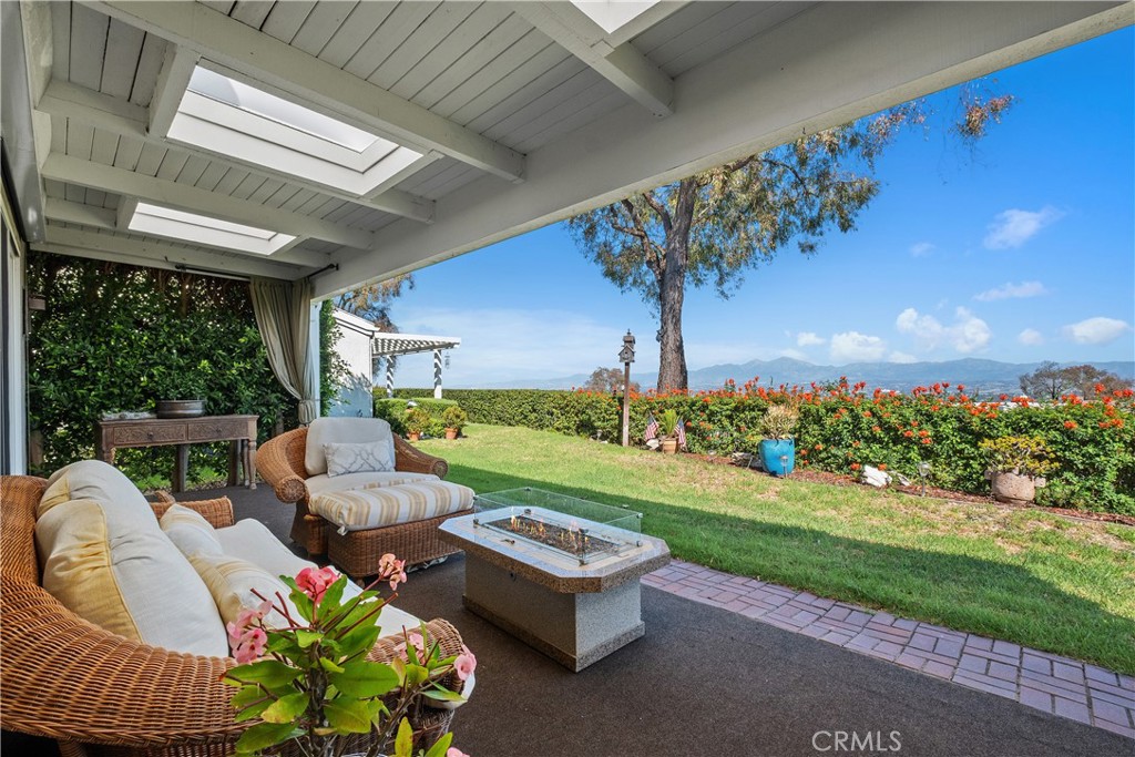 Covered outdoor patio with mountain views - 22886 Mariano, Laguna Niguel CA 92677 - photo 24
