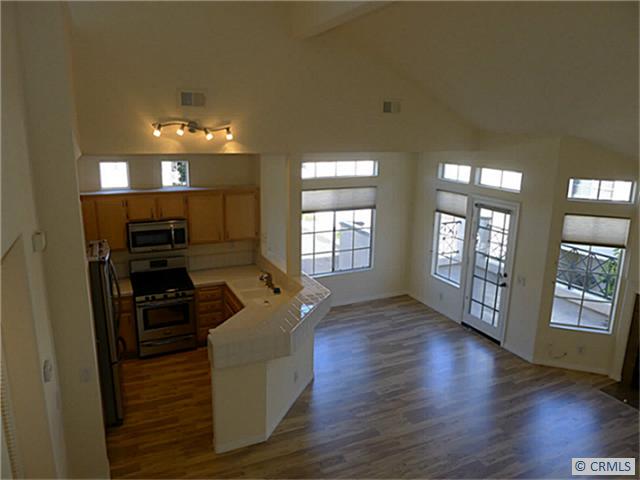 Open Living Room with deck - 235 SHOREBREAKER Drive, Laguna Niguel CA 92677 - photo 1